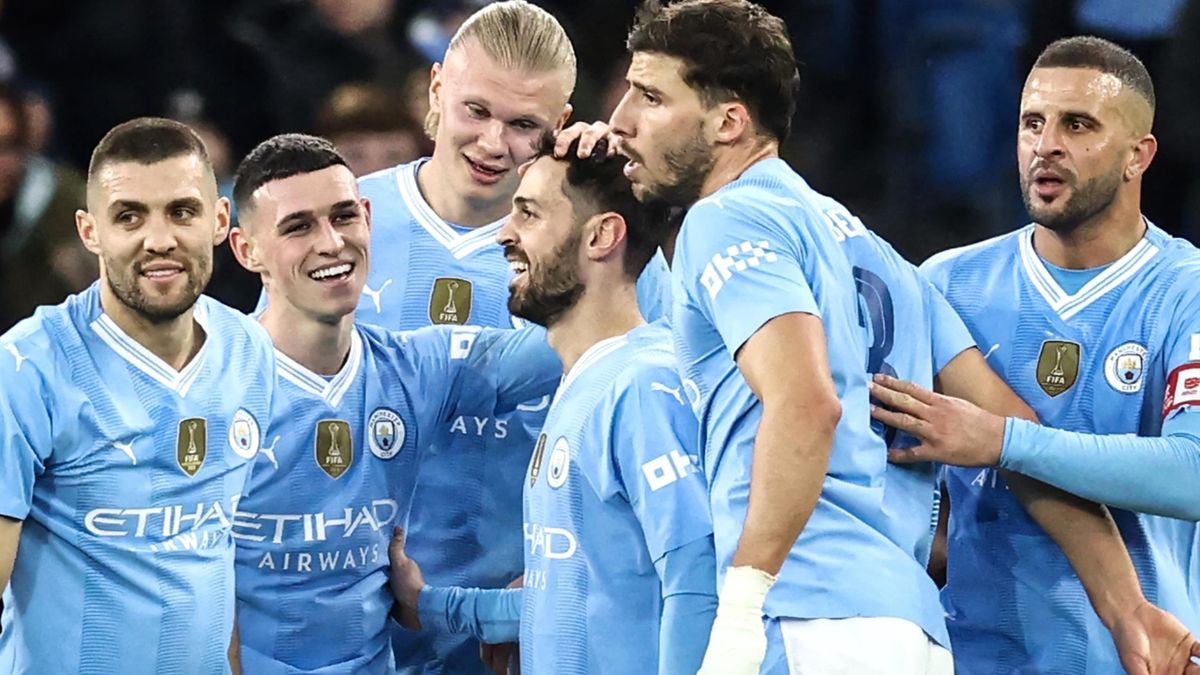 Man City Beats Burnley to Go Top as Title Race Reaches Boiling Point